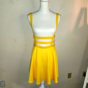 Retro Skirt w/ suspender detail and straps around the waist.